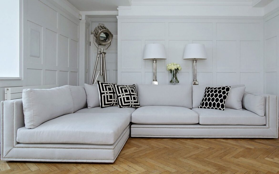 gray corner sofa in the guest room